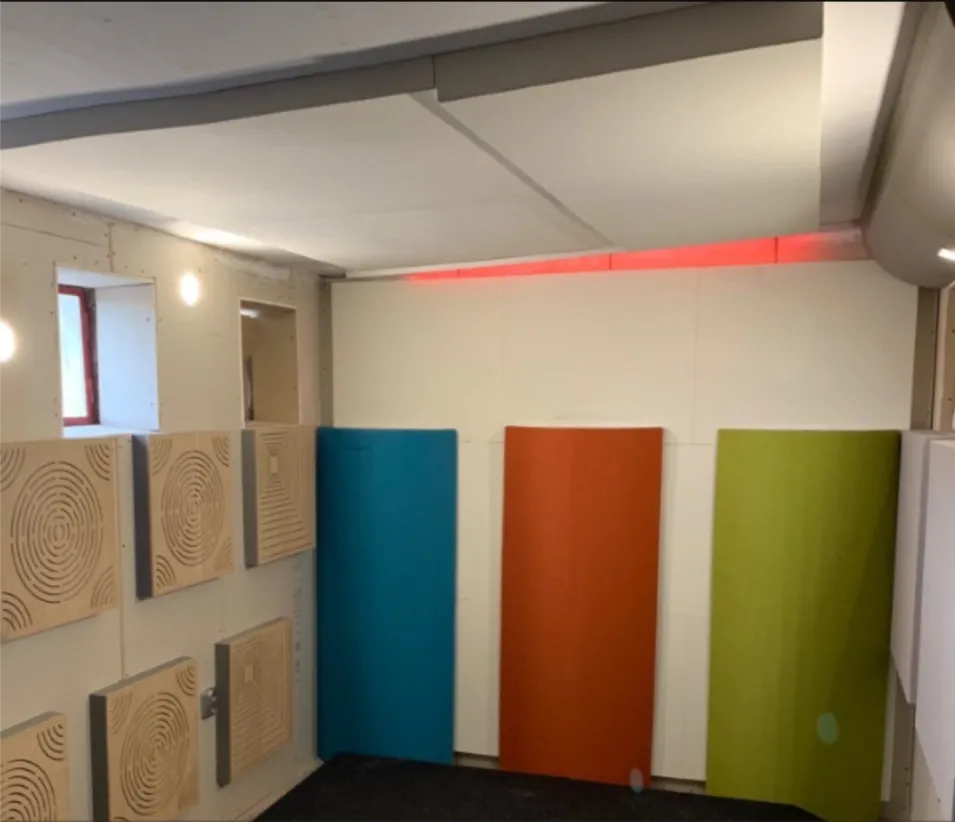 Custom acoustic and vibration isolation for a drum studio