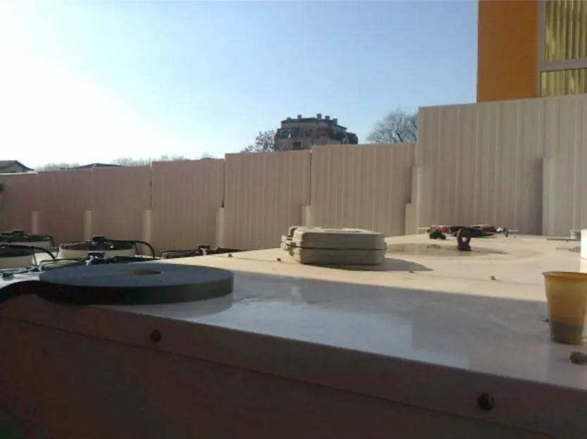 Sound insulating barrier for chillers at Billa