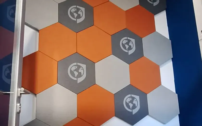 Echo reduction with logo acoustic panels for GLOBSEC