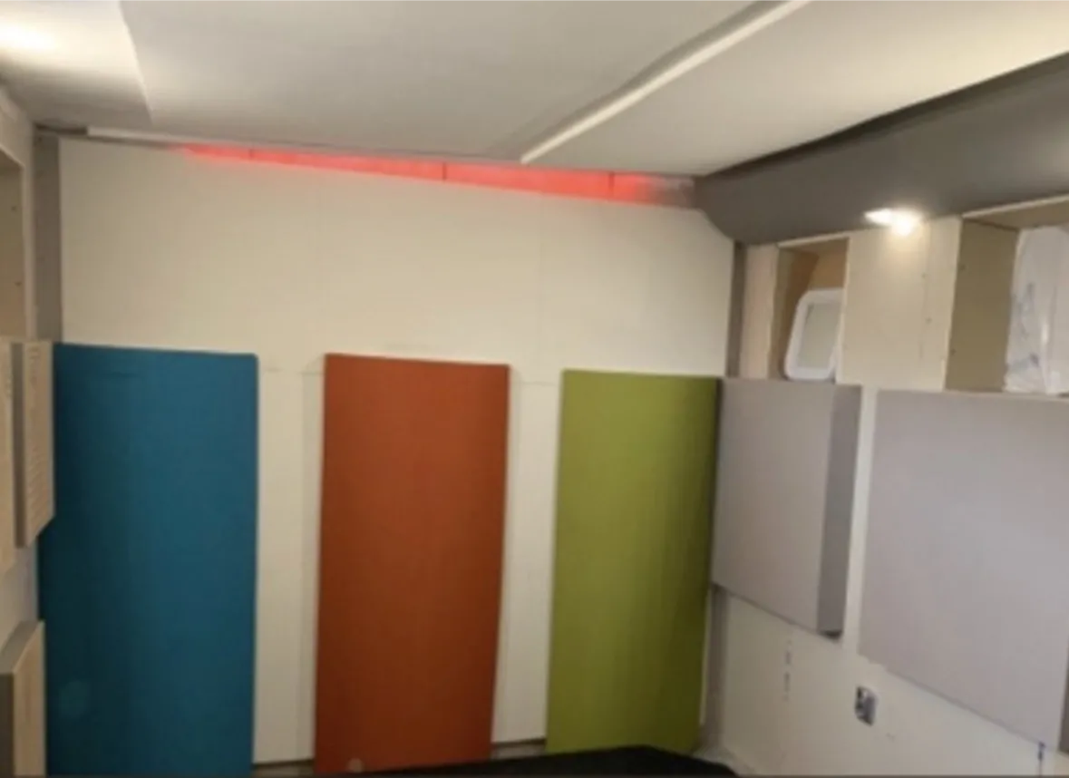 Custom acoustic and vibration isolation for a drum studio