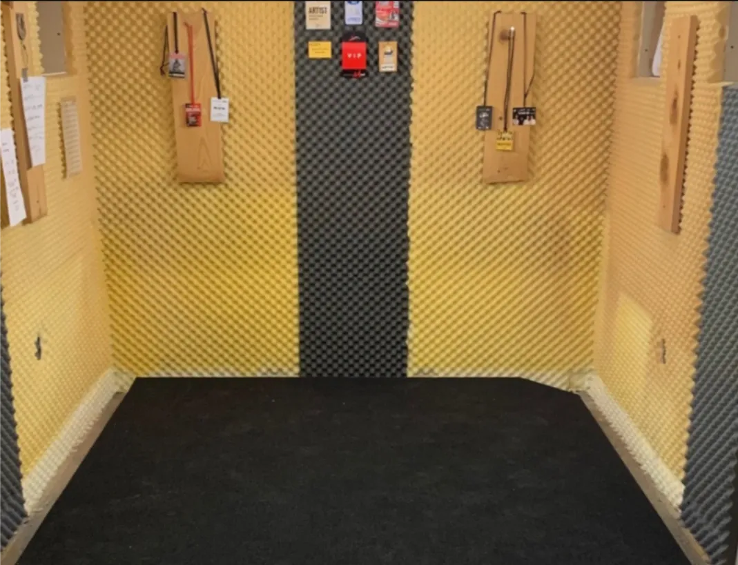 Custom acoustic and vibration isolation for a drum studio