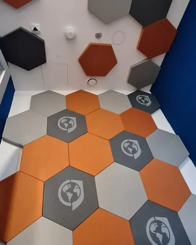 Echo reduction with logo acoustic panels for GLOBSEC