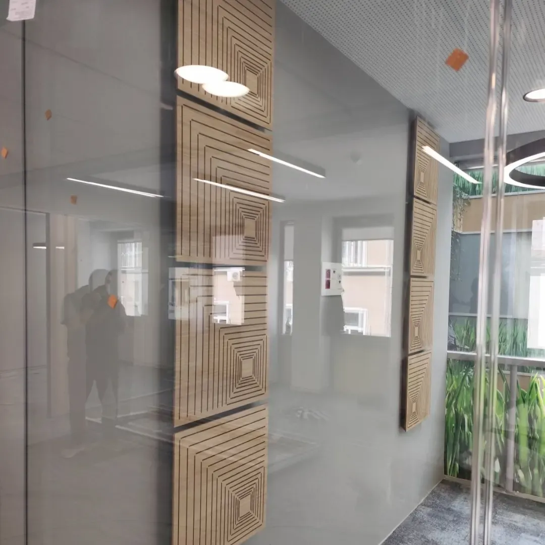 Acoustic Treatment of DSK Bank Office with Textile and Wooden Panels