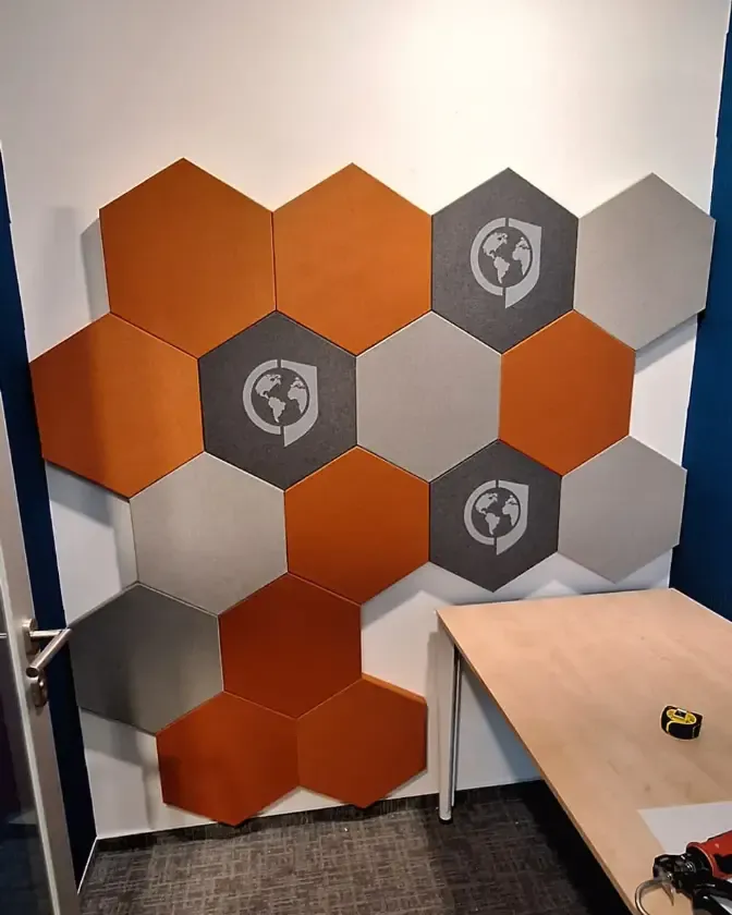 Echo reduction with logo acoustic panels for GLOBSEC